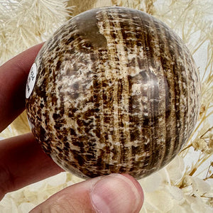 Peruvian Elegance: Aragonite Sphere of Harmony