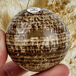 Peruvian Elegance: Aragonite Sphere of Harmony