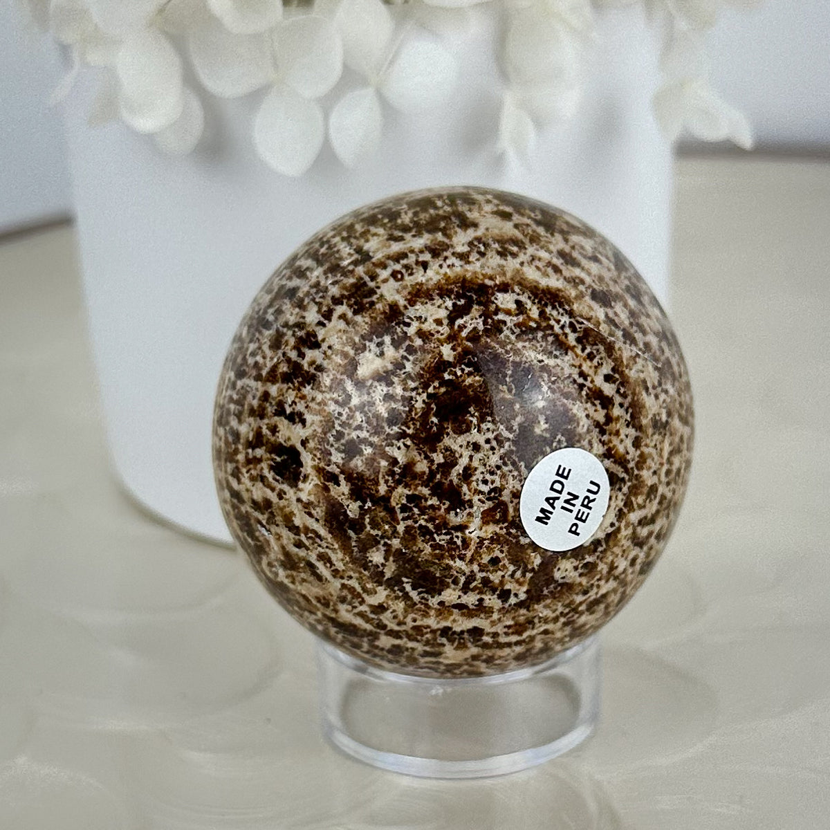 Peruvian Elegance: Aragonite Sphere of Harmony